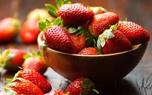 Juicy Red Strawberry On A Dark Background Wallpaper