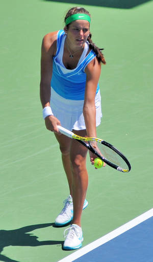 Julia Goerges Preparing To Serve Wallpaper