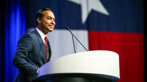 Julian Castro Smiling At A Podium Wallpaper