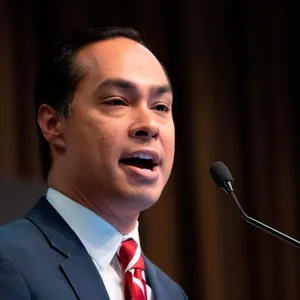 Julian Castro Speaking Into Microphone Wallpaper