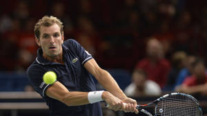 Julien Benneteau In Navy Blue Lacoste Polo Wallpaper