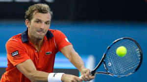 Julien Benneteau In Orange Polo Wallpaper