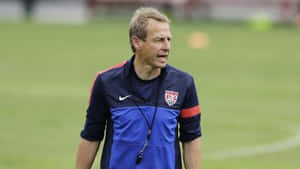 Jurgen Klinsmann On Football Field Wallpaper