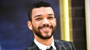 Justice Smith Engrossed In A Scene Wallpaper