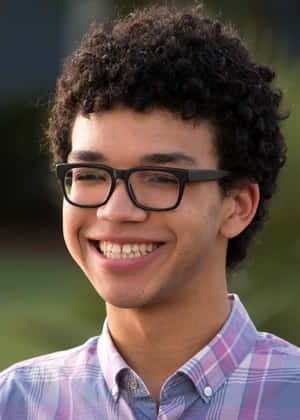 Justice Smith - Portrait In Action Wallpaper