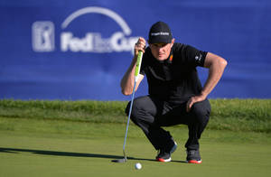 Justin Rose Squatting Wallpaper