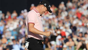 Justin Thomas During A Golf Match Wallpaper