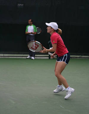 Justine Henin Showcasing Her Skills At The Rogers Cup Wallpaper