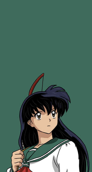 Kagome Higurashi Striking A Confident Pose In A Serene Forest Setting. Wallpaper