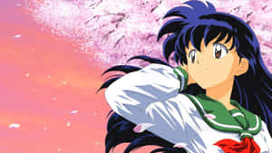 Kagome Higurashi Striking A Fierce Pose In A Captivating 1920x1080 Wallpaper Wallpaper