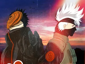 Kakashi And Tobi Face Off In An Intense Battle Wallpaper