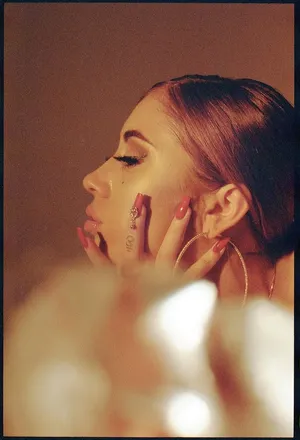 Kali Uchis Contemplative Portrait Wallpaper