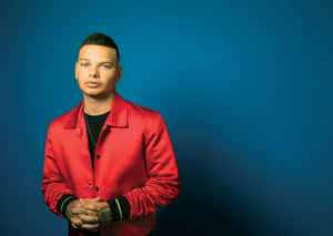 Kane Brown On Blue Background Wallpaper