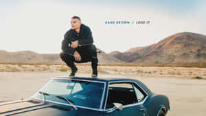 Kane Brown On Car Wallpaper