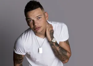 Kane Brown Posing Gray Background Wallpaper