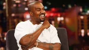 Kanye West Laughing During Interview Wallpaper