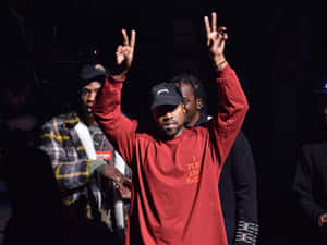 Kanye West Peace Sign Spotlight Wallpaper