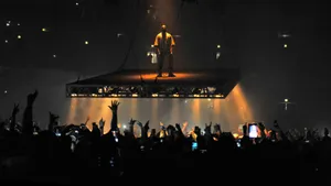 Kanye West Saint Pablo Standing Over Crowds Wallpaper