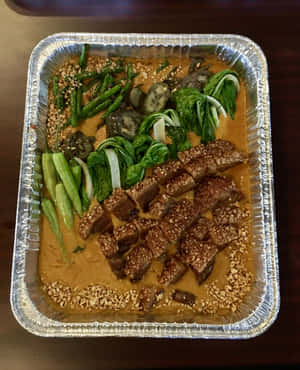 Kare-kare In An Aluminum Foil Tray Wallpaper