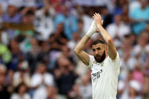 Karim Benzema Applaudingonthe Field Wallpaper