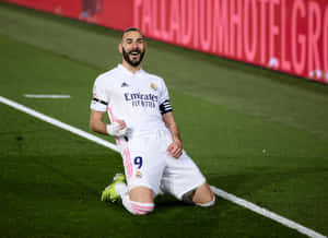 Karim Benzema Celebratingon Pitch Wallpaper