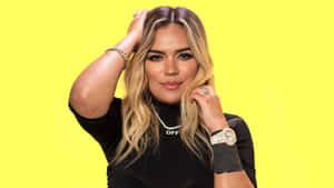 Karol G Black Outfit Yellow Background Wallpaper