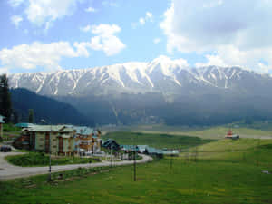 Kashmir_ Valley_ Snow_ Capped_ Mountains Wallpaper