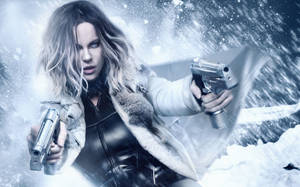 Kate Beckinsale As Selene Holding Guns Wallpaper