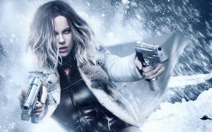 Kate Beckinsale Stars As The Vampire Warrior Selene In The Action-packed Underworld Movie Series Wallpaper