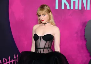 Kathryn Newton Elegant Black Dress Event Wallpaper