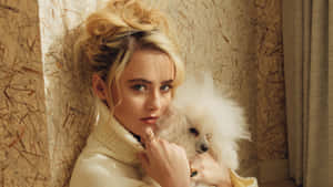 Kathryn Newton Elegant Portraitwith Poodle Wallpaper