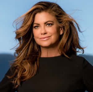Kathy Ireland Posing Elegantly For A Photoshoot Wallpaper