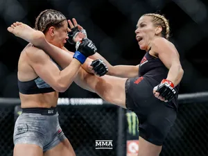 Katlyn Chookagian Kicking Opponent Wallpaper