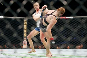 Katlyn Chookagian Masterfully Evading An Attack During A Match. Wallpaper