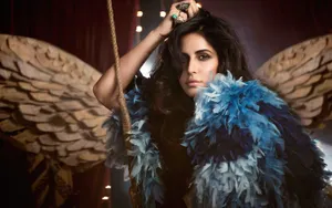 Katrina Kaif In Blue Feather Bolero Wallpaper