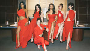 Katseye Women In Red Dresses Group Posing Wallpaper