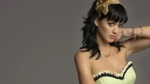 Katy Perry Stuns In A Yellow Dress Wallpaper