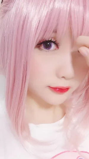 Kawaii Anime Cosplayer In A Colorful Café Wallpaper