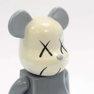 Kaws Bearbrick Closeup Wallpaper