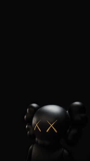 Kaws Companion Figurein Shadow Wallpaper