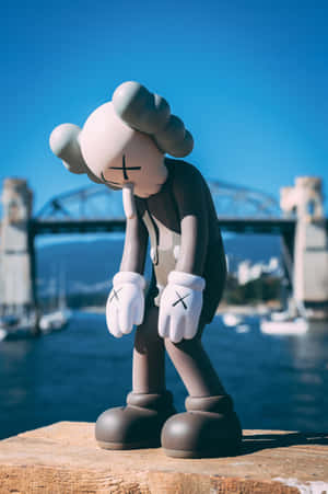 Kaws Figure Harbor Backdrop Wallpaper