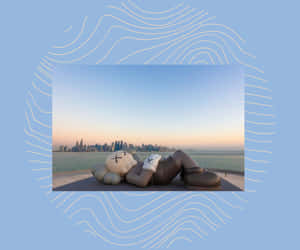 Kaws Holiday Art Installation In A Breathtaking Natural Landscape Wallpaper