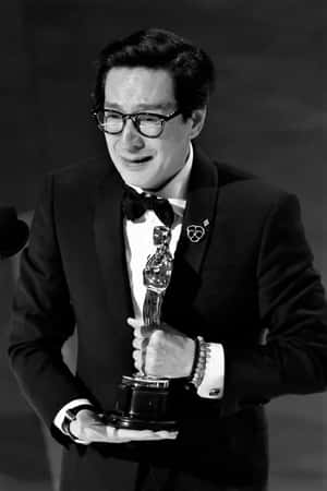 Ke Huy Quan - Iconic Actor And Child Star Wallpaper