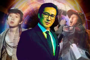 Ke Huy Quan Posing Confidently Wallpaper