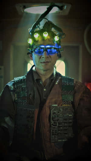 Ke Huy Quan Smiling On A Photoshoot Wallpaper