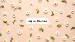 Keep On Sleeping On A Pink Background With Daisies Wallpaper