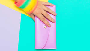 Keep Your Phone, Cards And Cash Safe And Secure With This Stylish Purple Wallet. Wallpaper