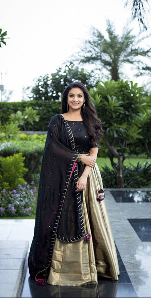 Keerthi Suresh Black And Bronze Wallpaper