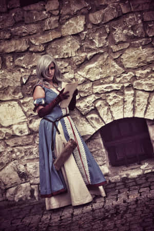 Keira Metz Cosplay Against Stone Wall Wallpaper