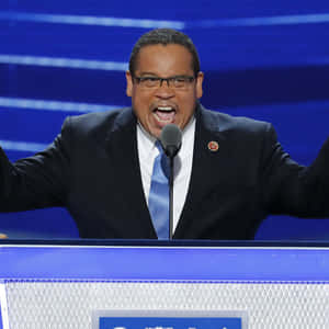 Keith Ellison Giving Energetic Speech Wallpaper